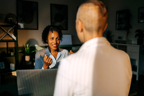 istock Well dressed businesswoman talking with client at the office 2170493709