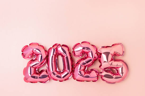 istock 2025 - pink metallic foil balloons. New Year concept. 2170494098