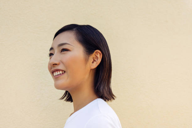istock Woman Smiling Joyfully in a Close-Up Portrait 2170495552