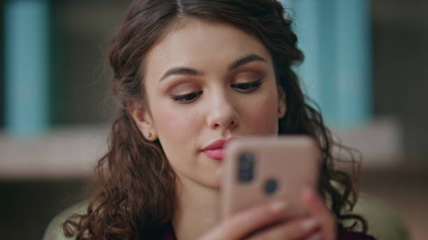 istock Successful woman typing cellphone at work. Closeup hands holding mobile phone 2170496550