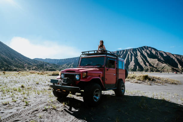 istock Overlooking Adventure: A Moment at Bromo Volcano 2170498349