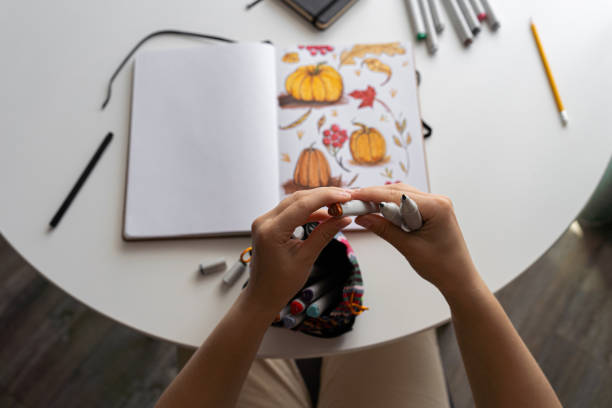 istock Hand coloring autumn-themed illustration with markersv 2170506464