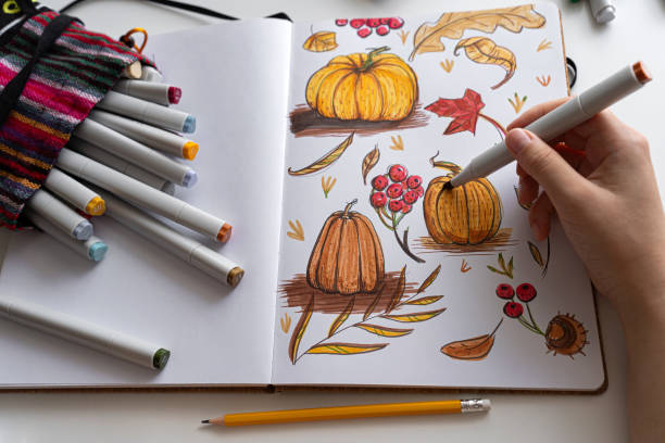 istock Hand coloring autumn-themed illustration with markers 2170506696