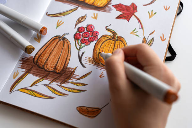 Hand coloring autumn-themed illustration with markersv