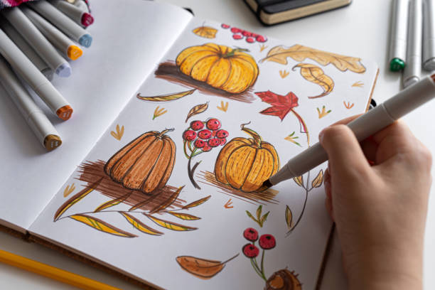 istock Hand coloring autumn-themed illustration with markers 2170506746