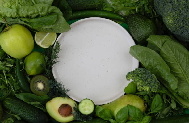 Vibrant green produce frames simple white plate.