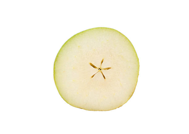 A cross-section of a ripe pear shows its smooth texture and inner seeds against white.