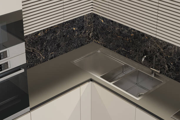 istock Modern Small L shape Kitchen with white cabinets and large black marble tiles. 2170511958
