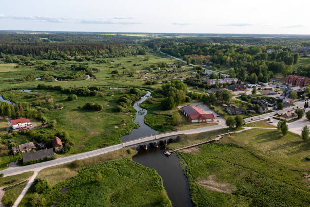 istock Stone Bridge Crossing River in Grassy Area 2170511977