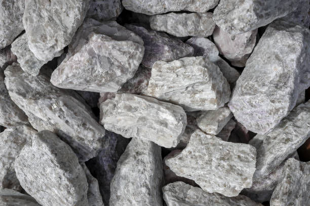 Hard rock spodumene ore, commercially important source of lithium. Mine, mining, background, copy space.