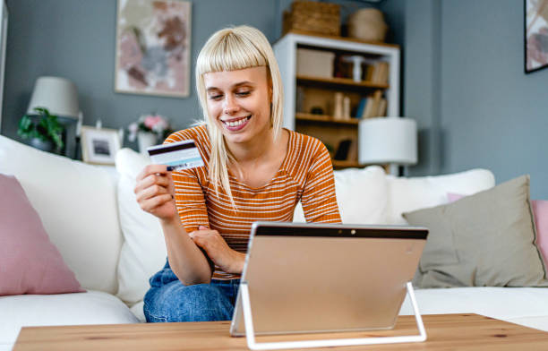 istock Woman using a tablet for online payment 2170514609