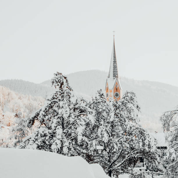 Mountain Bavarian winter landscape with church view
