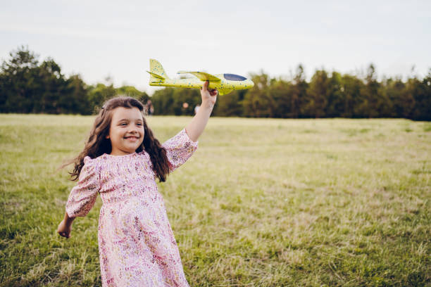 istock Girl playing outdoor 2170526189