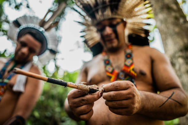 istock Close-up of a indigenous man with a blowpipe 2170529360