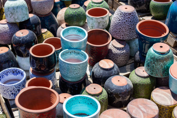 istock Ceramic vibrant flower pots outdoors in sunny day 2170533420