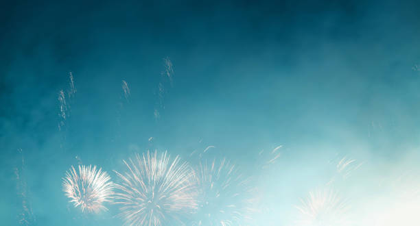 istock Blue fireworks bloom on the dark sky 2170533441