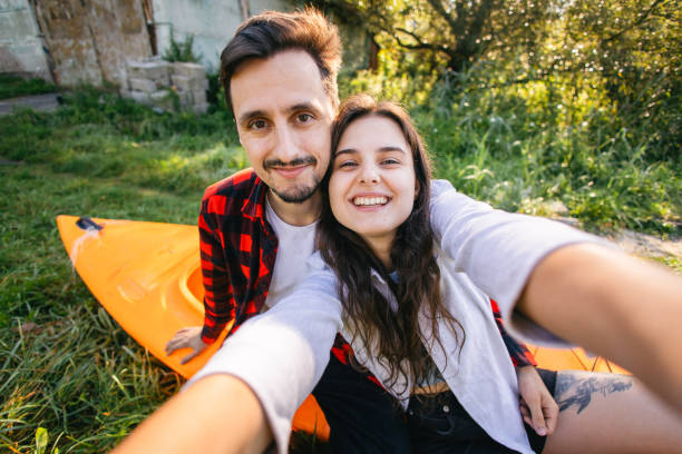 istock Cheerful Couple Taking a Selfie After Kayaking Adventure 2170535525