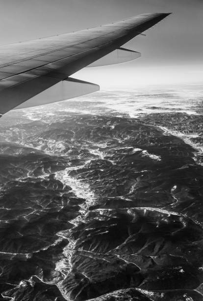 Mongolia mountains are seen from an airplane window