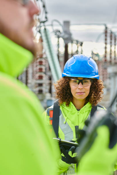 istock substation female power worker 2170538123