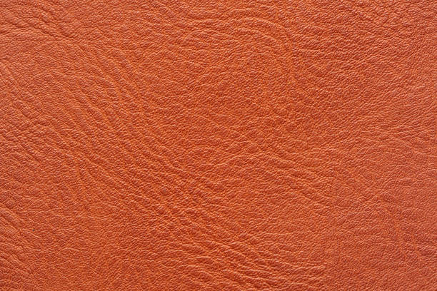 istock Brown macro leather texture,Synthetic leather brown background texture. Brown leather textured background. 2170544260
