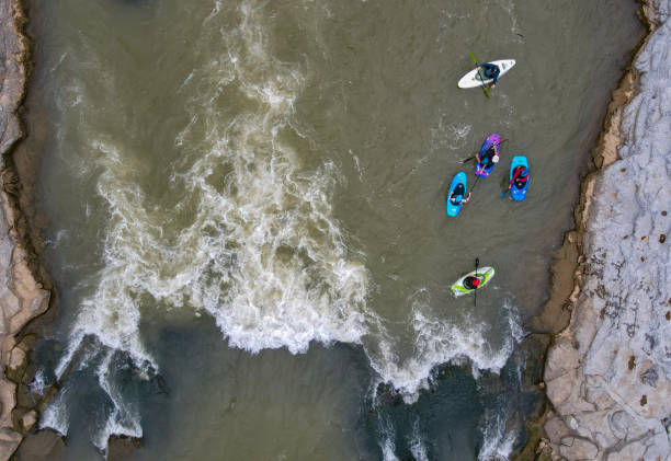 Skilled whitewater kayaker in a \