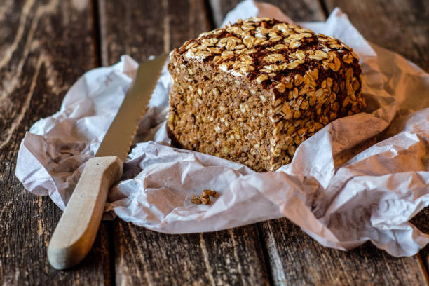 Wholemeal rye bread on a wooden board