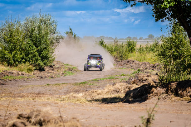 istock UTV vehicle offroad kicking up sand on dune. Extreme, adrenalin. 4x4. 2170551900