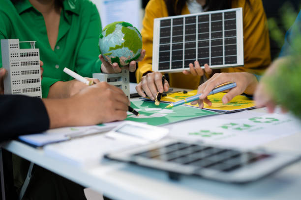 istock colleagues discussing data working and tablet, laptop with on Construction Site project, green energy and solar panel concept. 2170553386