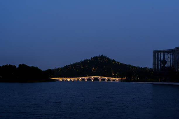 istock Artificial mountain and bridge at the park in the blue hour 2170554063