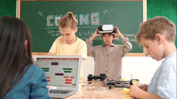 istock Asian child wearing Vr headset while enter virtual world at classroom. Pedagogy. 2170558269