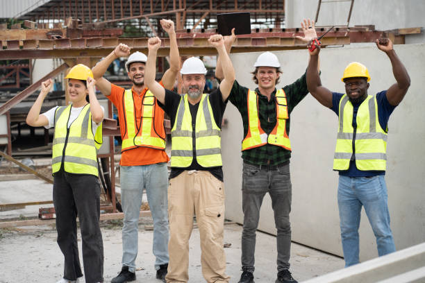 istock Portrait mature Caucasian engineer man with Multi-ethnic Team engineer or team labor cheer at precast cement outdoor factory 2170563755