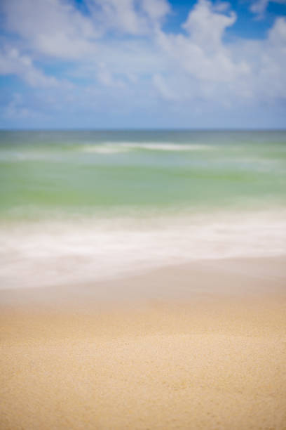 Smooth beach waves stock photo