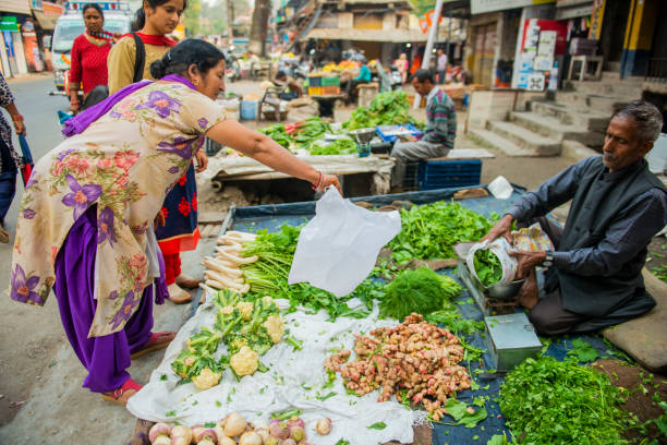 Himachal Pradesh, India-November 01, 2017: Man Selling Fresh Vegetables by the Street.