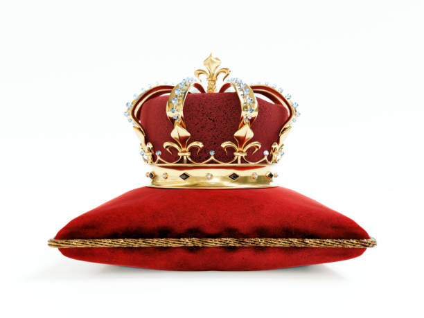 istock Monarch crown on red velvet cushion 2170569559