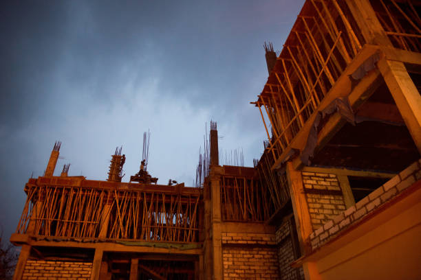 Assam, India- March 31, 2016: View of an under-construction building from below in the evening light.
