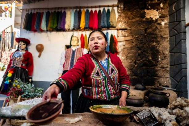 istock Chinchero indigenous woman explaining about textile industry, in Chinchero District, Peru 2170571009