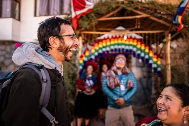 istock Tourist man talking with chinchero indigenous, in Chinchero District, Peru 2170571621