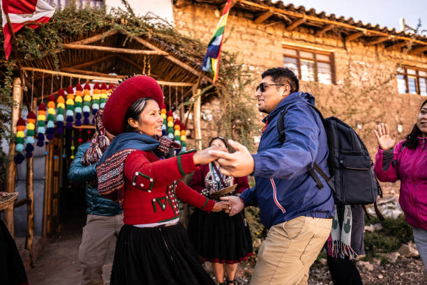 istock Chinchero indigenous dancing with tourist, in Chinchero District, Peru 2170571627