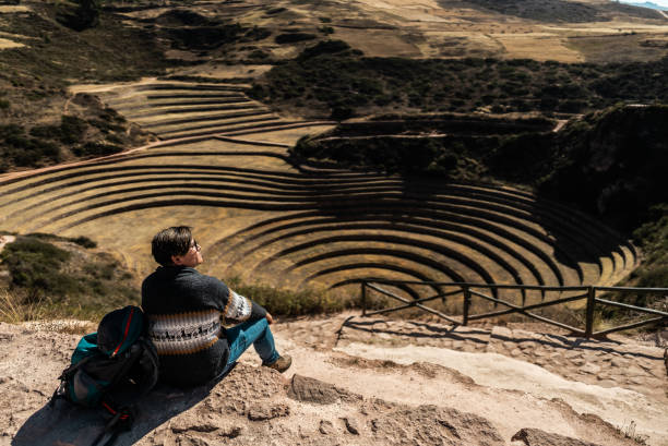 Serene woman hiking in Altiplano during experiential trip to Peru