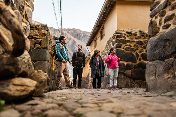 istock Tour guide talking with tourists on a Chinchero district, Peru 2170572263