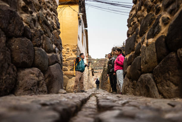 istock Tour guide talking with tourists on a Chinchero district, Peru 2170572265