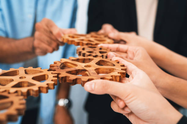 istock Business team joining cogwheel in circular together. Prudent 2170574427