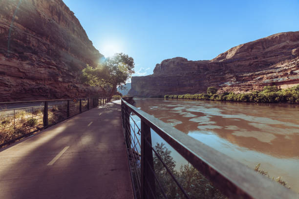 The famous offroad Shafer trail in the canyon near Moab, reaching Canyonland National park, Utah. View on the Colorado river