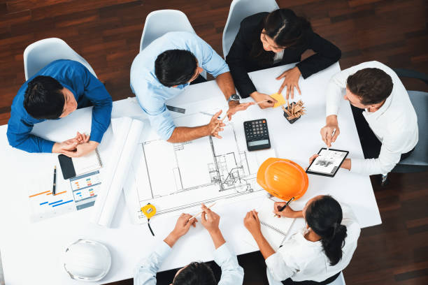 istock Diverse group of civil engineer and client working on architect. Prudent 2170578599