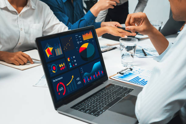 istock Analyst team uses BI Fintech on a laptop to analyze financial data. Prudent 2170578703