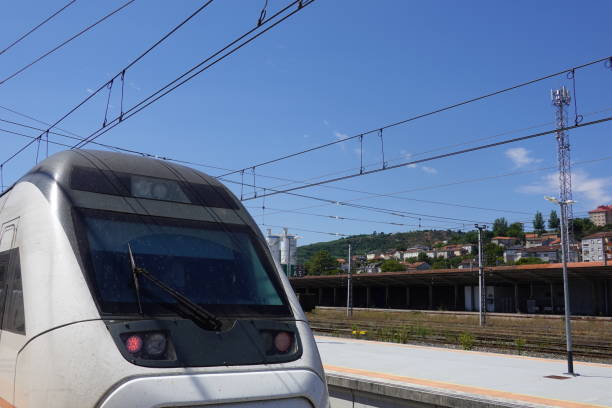 istock Modern Train at a Station Platform on a Clear Day 2170578718