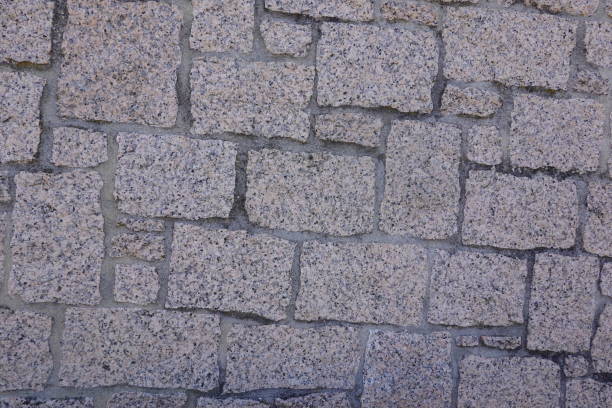 A sturdy and artistic arrangement of granite stones showcases natural beauty.