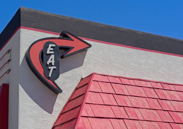 istock Eat sign on side of building as design element 2170581172