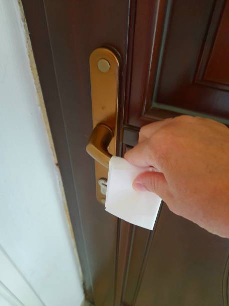 istock Bronze color doorknob with hand 2170581472