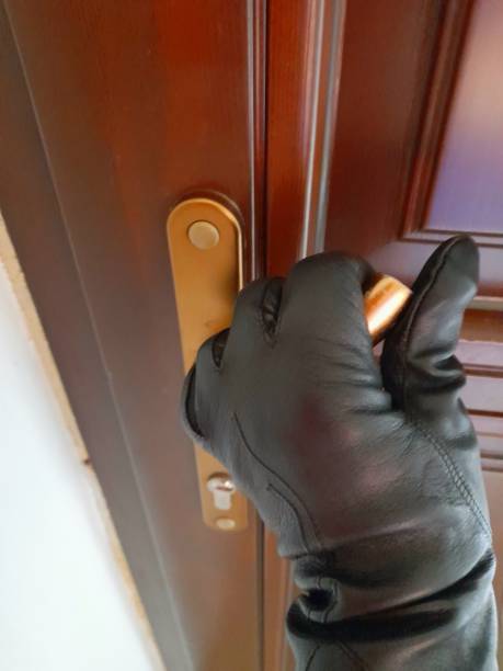 istock Bronze color doorknob with hand 2170581485